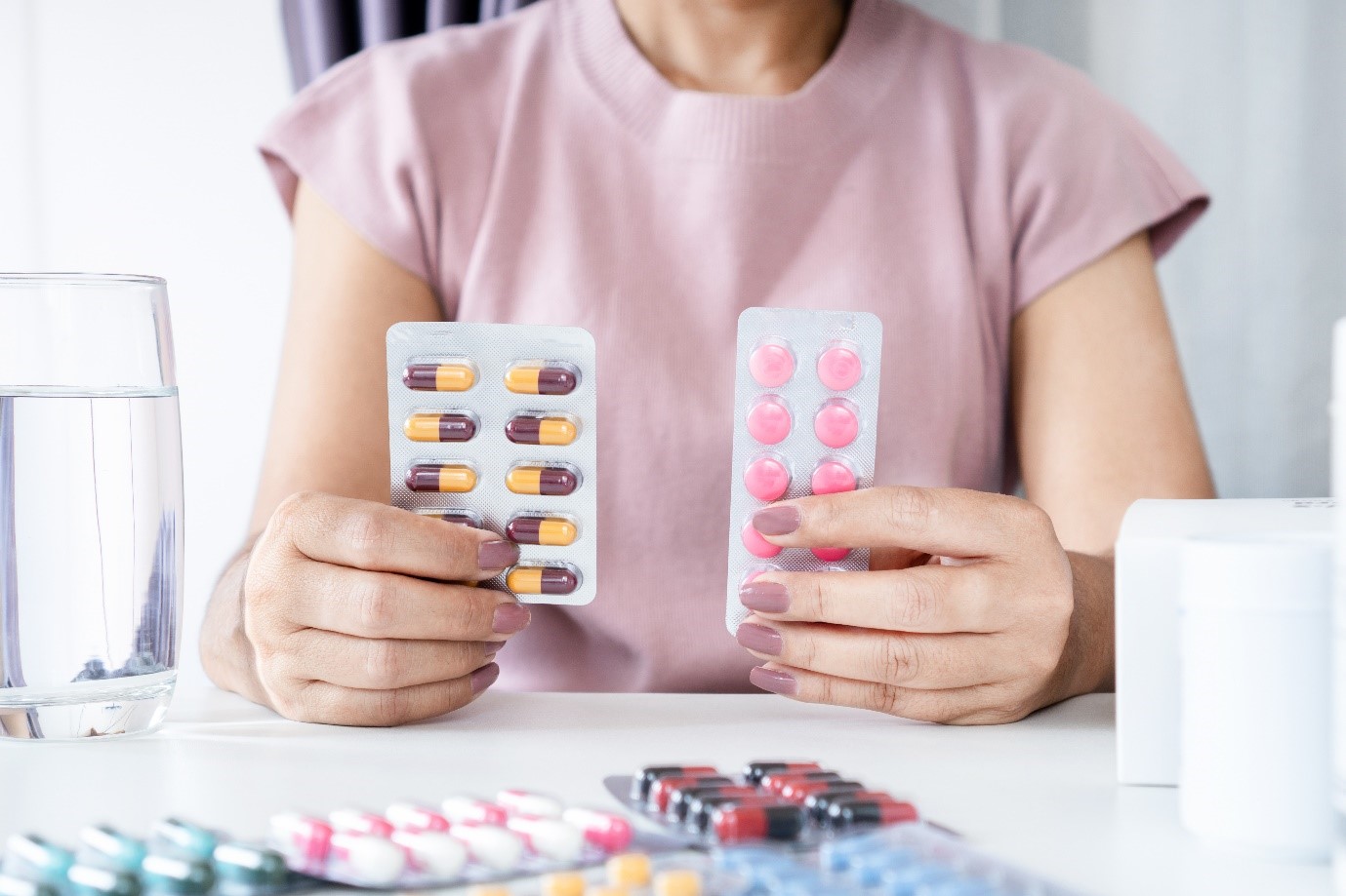 Image showing the doctor holding medications in hand