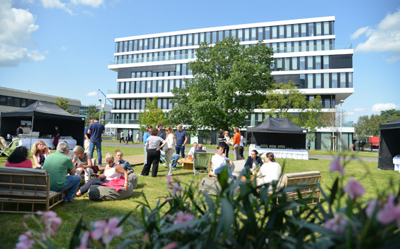 Happy Grünenthal colleagues celebrating outdoors