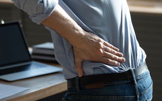 Man holding his back in pain